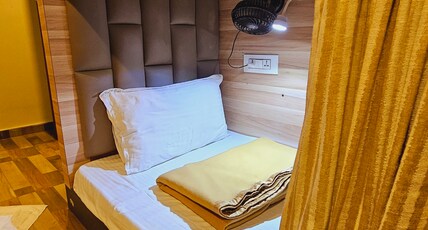 Clock Inn Dormitory Room Type - AC Dormitory beds