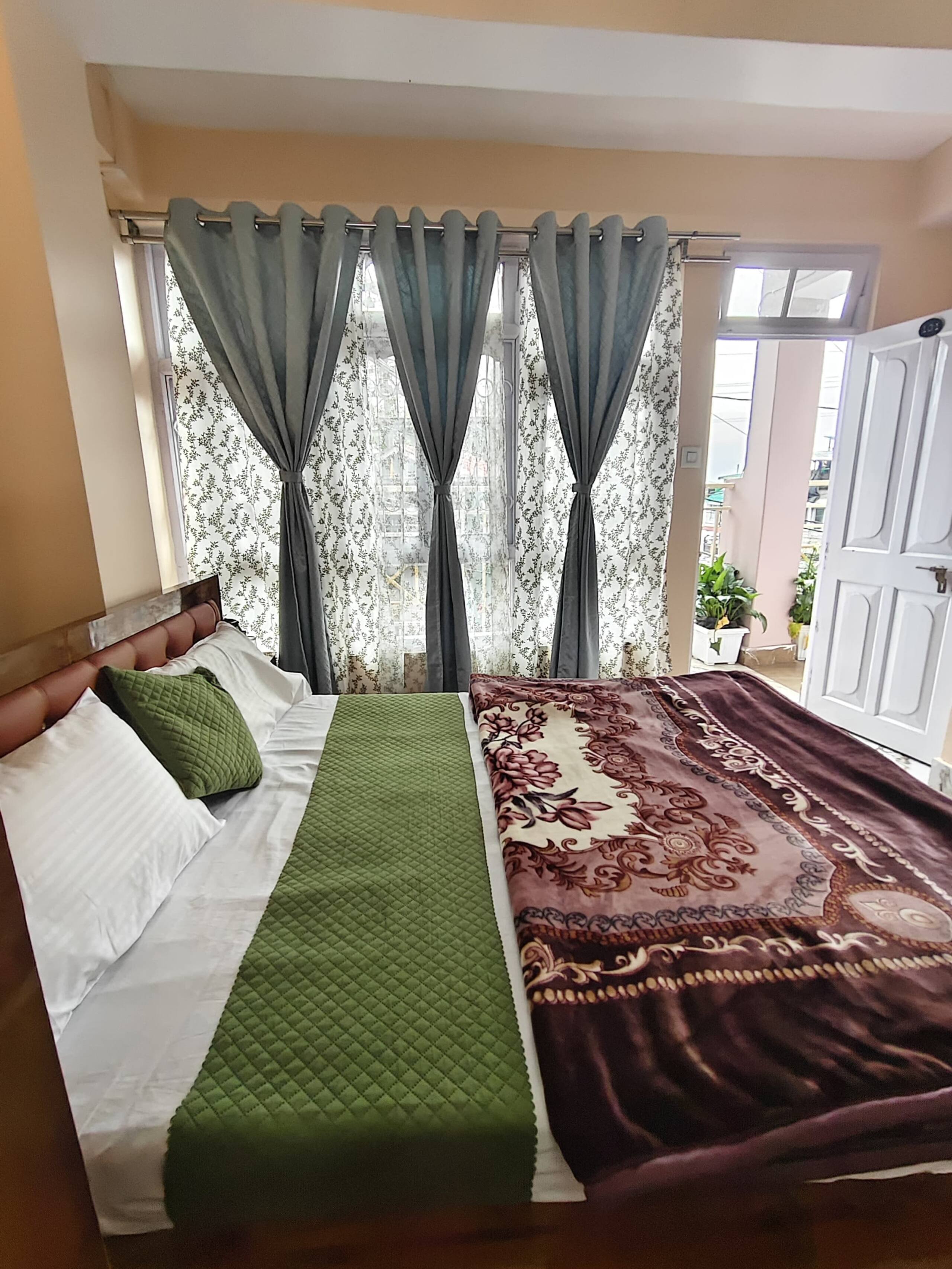 Rejoice homestay Room 101 - Tap to explore photos