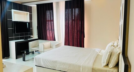 Ambalika Hotel Room Type - Deluxe Room