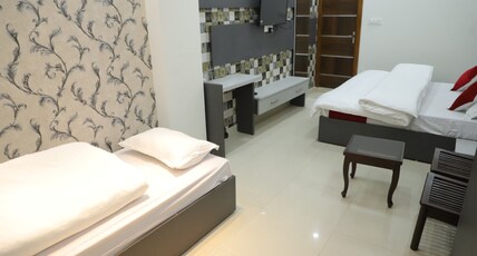 The Shailyas Room Type - Family Suite with Mountain View(King size bed+Sofa Cum Bed) The Shailyas Room Type - Family Suite with Mountain View(King size bed+Sofa Cum Bed)
