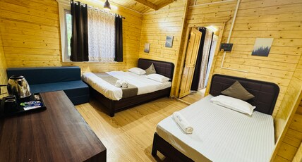 COASTAL BAY INN ALIBAUG Room Type - Deluxe Wooden Family Suite