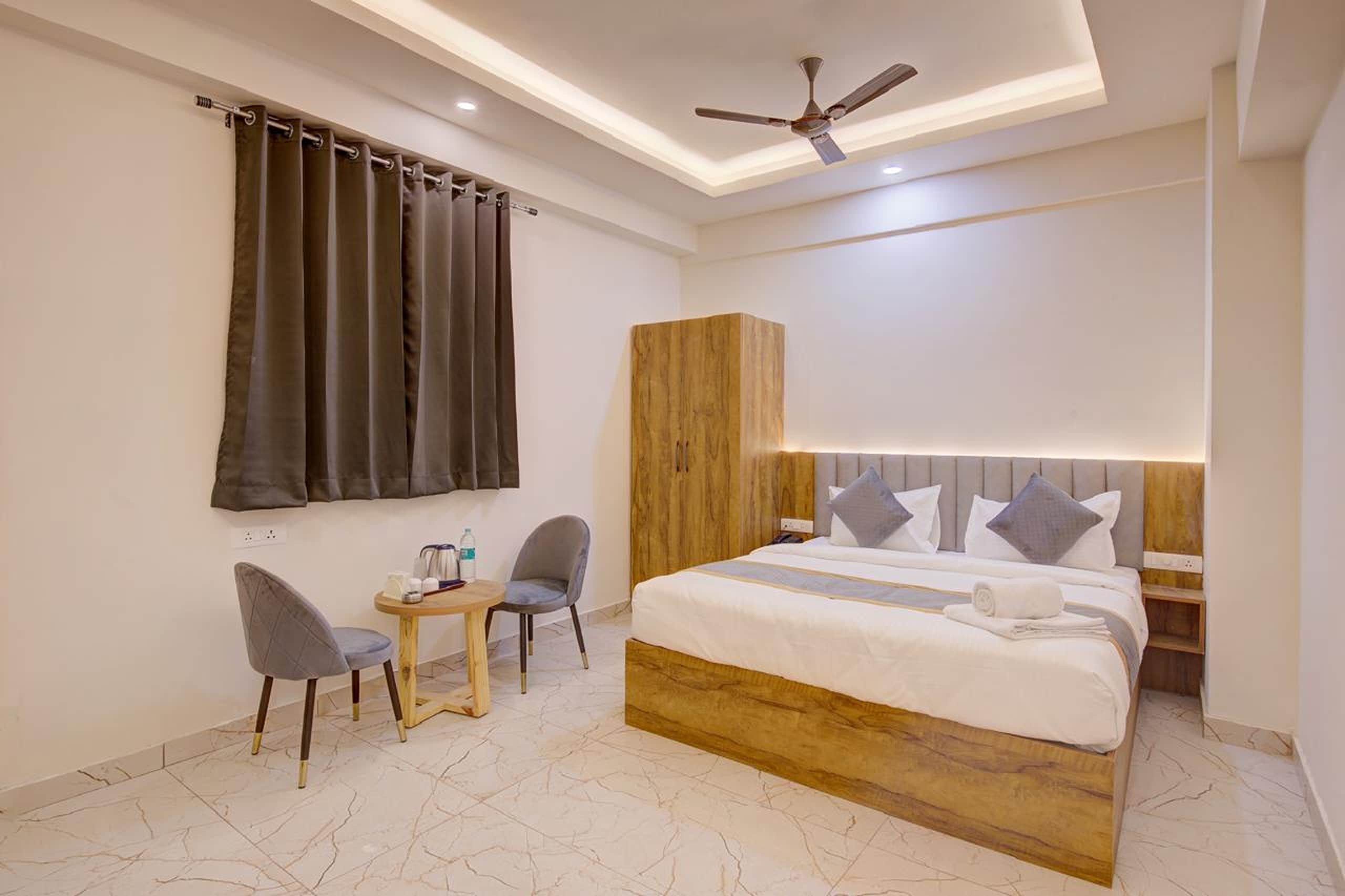 Hotel Tree Suites Next Airport Inn - Tap to explore photos