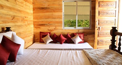 The Waterfront Kolad Room Type - AC Lake Facing Wooden Interior Cottages