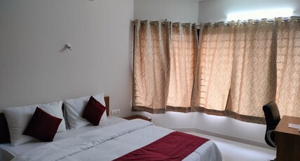 NP hospitality,Magarpatta Room Type - A1 Delux room Master Bedroom