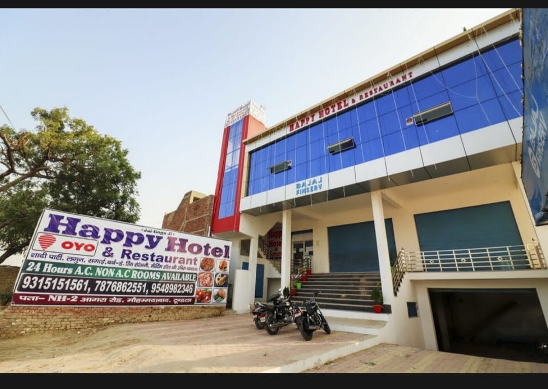 Happy Hotel and Restaurant by WB Inn - Tap to explore photos