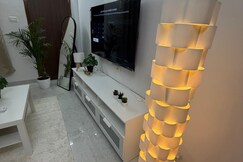 301 Elegant 1BHK Lux Stay Viman Nagar 55Inch TV