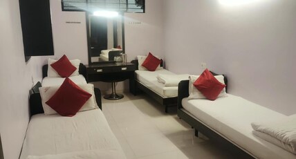 Majestic Hotel Room Type - 4 Bed Non AC Room Majestic Hotel Room Type - 4 Bed Non AC Room