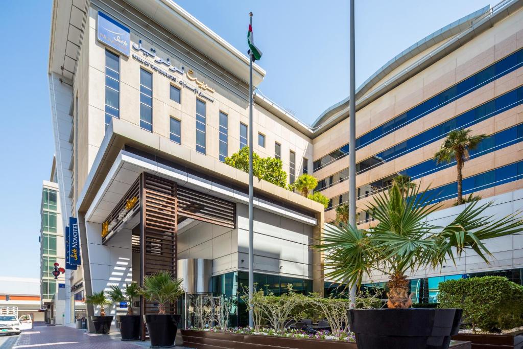 Novotel Suites Mall Avenue Dubai - Tap to explore photos