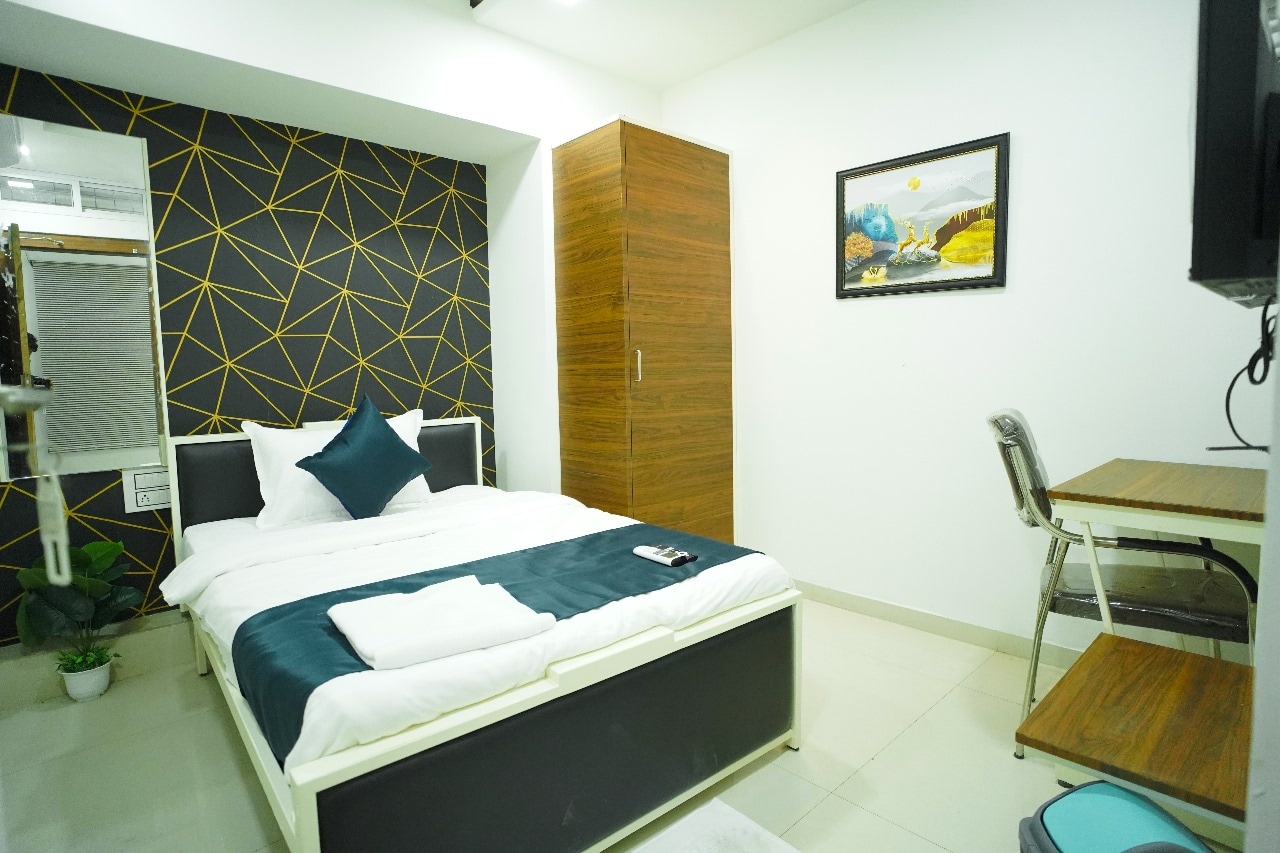 Hotel Amogh - Tap to explore photos