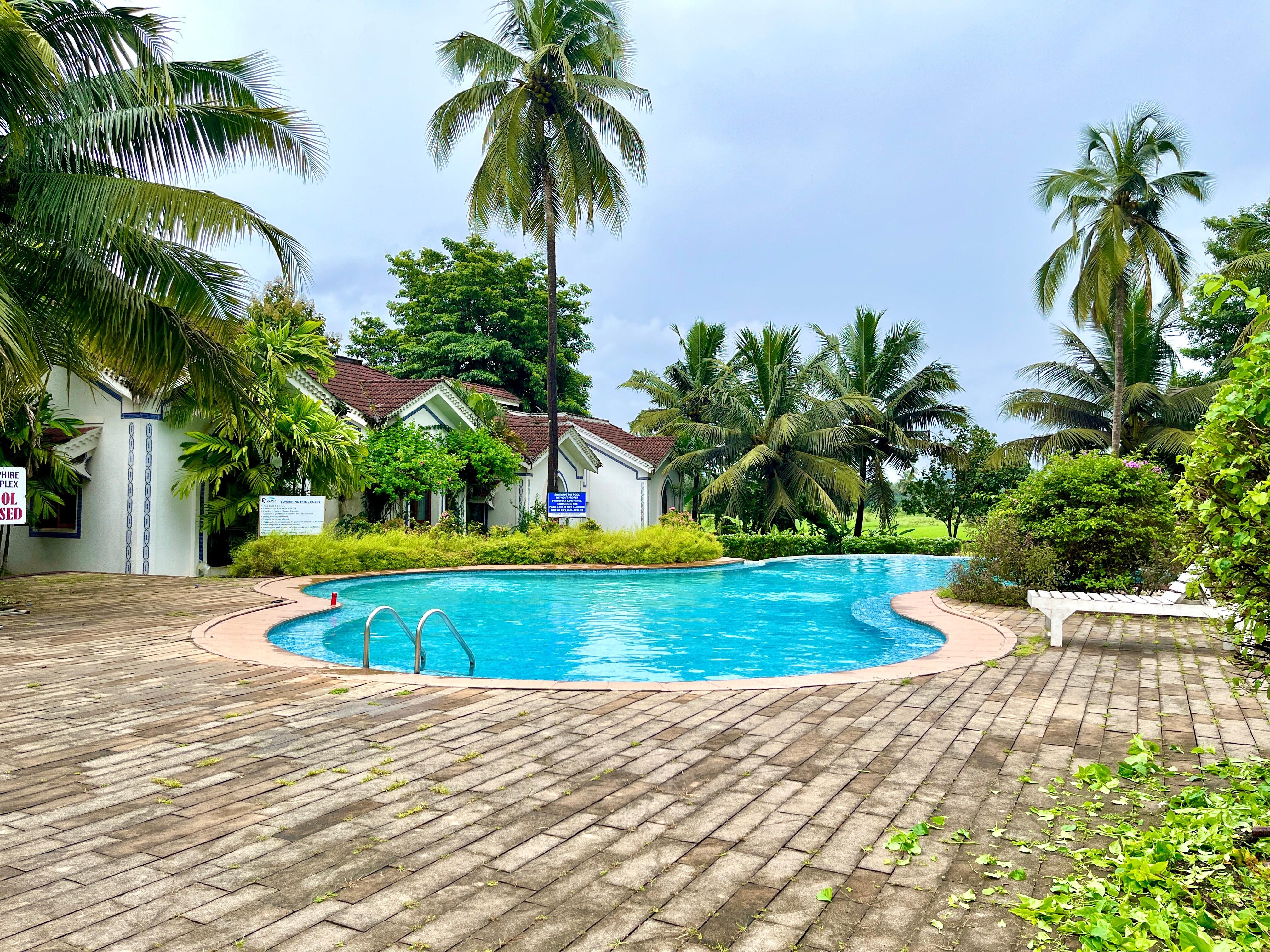 Cozy Poolside Studio Flat in Siolim - Tap to explore photos