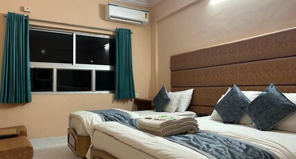 Hotel Shree Darshan Room Type - 3 Bedded AC Family Room (Price is for 3 adults)