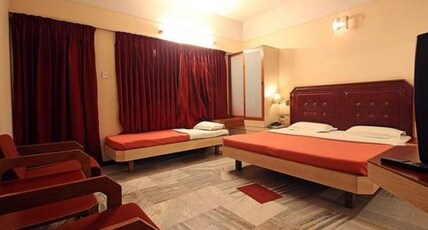 Hotel Padmam  Room Type - Deluxe Triple With Balcony