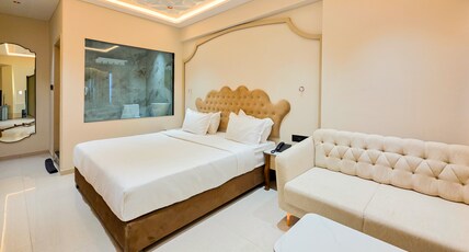 Hotel Nova Bloom Room Type - Business Suite with Sofa & 43 Inch Smart Android T.V. for Netflix and Chill