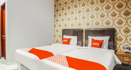 Super OYO Capital O 92066 Papakoel Hotel & Cafe Room Type - Indonesia Deluxe Twin