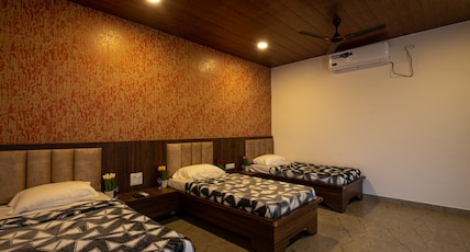 Takshshila Park and Resorts Room Type - Deluxe Garden View (Triple Sharing) Takshshila Park and Resorts Room Type - Deluxe Garden View (Triple Sharing)