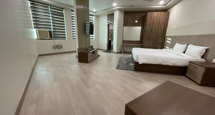 Aman Paradise Hotel & Banquet Room Type - Deluxe Twin Bed Room