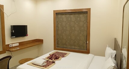Hotel SJ Pride Inn Room Type - Deluxe AC