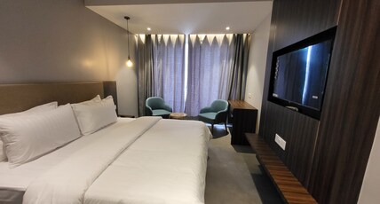 Belvedere Suites, Greater Noida Room Type - Deluxe Room with King Bed