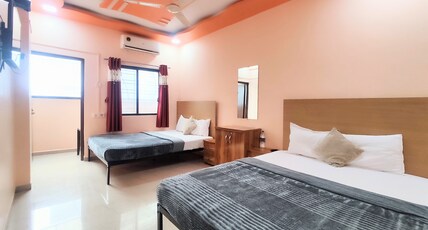 AMBIENT STAY Room Type - Family AC Room with Balcony