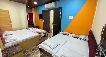 Jain Home Stay Guest House Room Type - Deluxe Room ( Balcony Room )