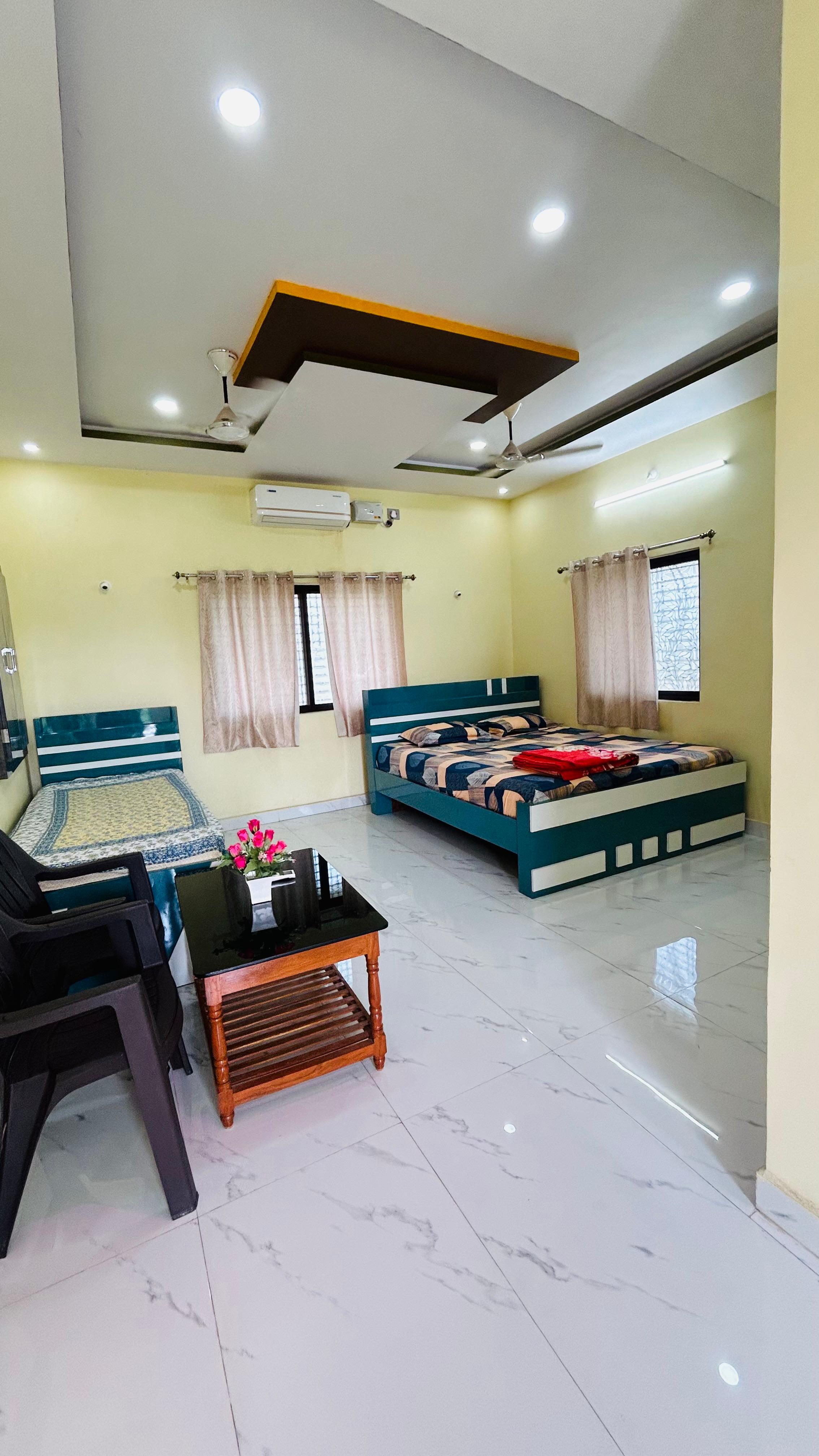 Aditya Tourist Home - Tap to explore photos