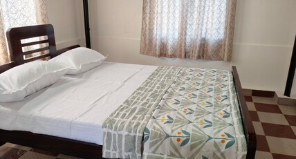 Flintstone Home Coorg. Room Type - Sharavathi