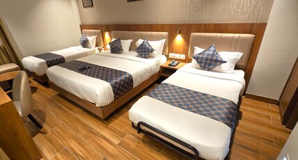 Hotel Liza Royale near Chennai Central Railway Station Room Type - Premium Quad Room