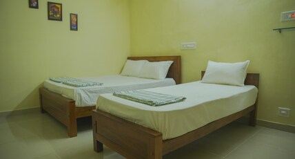 Sri Sai Grande Inn. Room Type - 5 Bed Deluxe Family Room