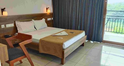 Peacock residency Room Type - DELUXE ROOM