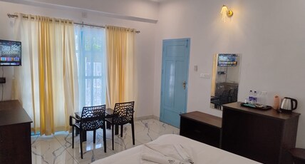 Gulmohar Varkala Room Type - Deluxe Double Room AC with Balcony