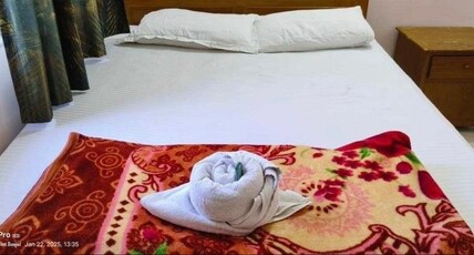 Nirmal Guest House Room Type - Deluxe Room (A.C)