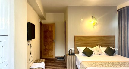 Swastika Lodge and Cafe Room Type - Deluxe Room
