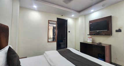 Hotel Satyam Room Type - Deluxe Double Bedroom Hotel Satyam Room Type - Deluxe Double Bedroom