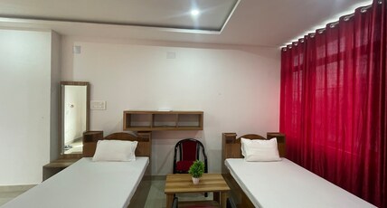 Raimona Residency Room Type - Double Bedroom - AC