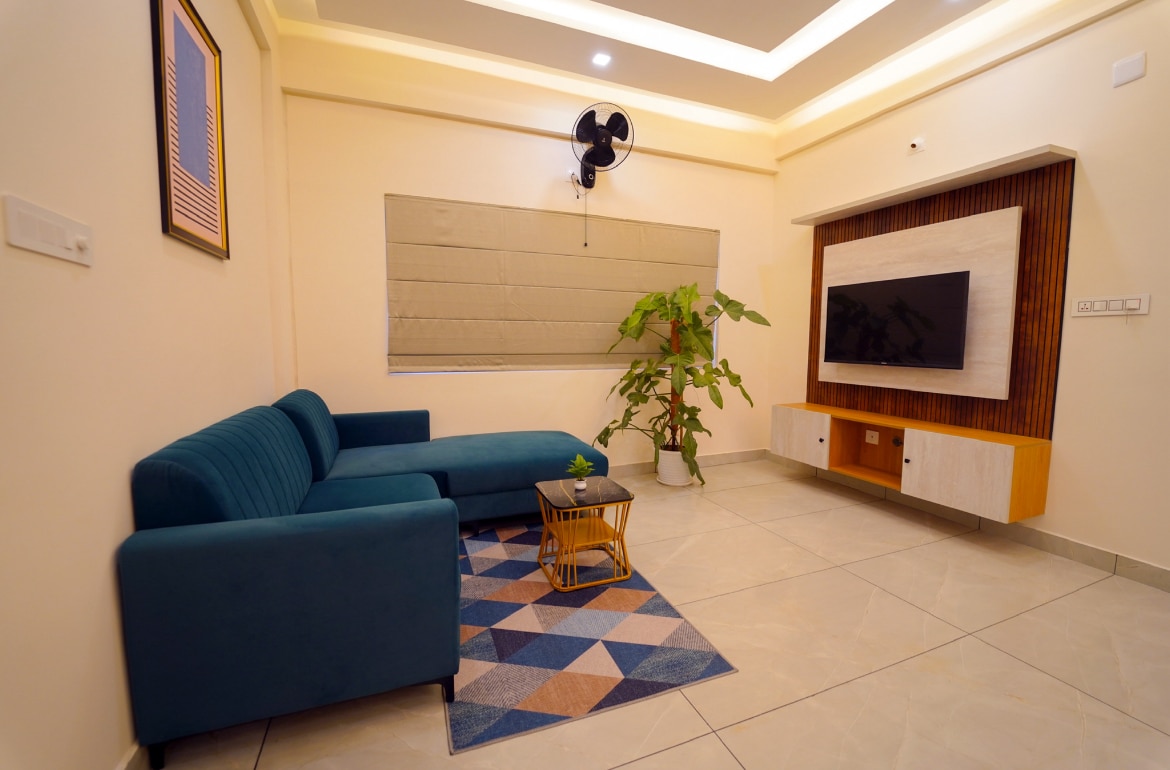 Revoura Heights 2BHK | Between Hills and City - Tap to explore photos
