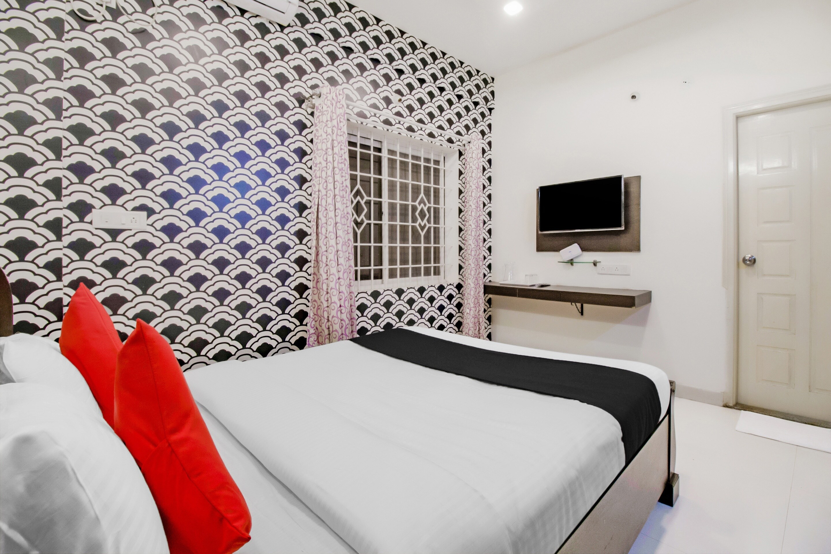 Hotel O Sln Suites - Tap to explore photos