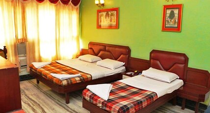 Hotel Nrupatunga Room Type - Three Bed AC Deluxe