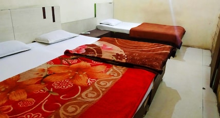Maa Tulsi Guest House Room Type - Four Bed AC Room Maa Tulsi Guest House Room Type - Four Bed AC Room
