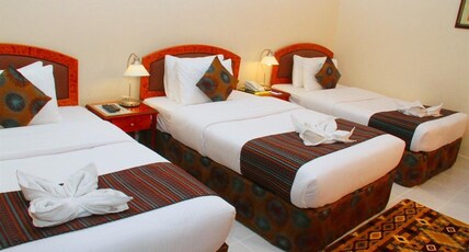 Nejoum Al Emarat Hotel Room Type - Triple Room
