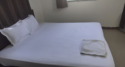 M.R Residency | Rooms in an Apartment Room Type - Deluxe Room
