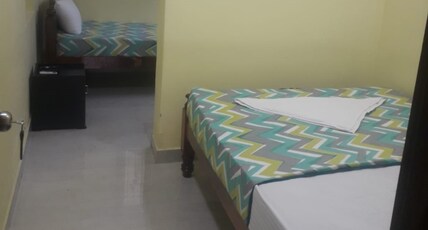 Varadhar Guest House Near Varadarajar Temple Room Type - Deluxe triple bed room Varadhar Guest House Near Varadarajar Temple Room Type - Deluxe triple bed room