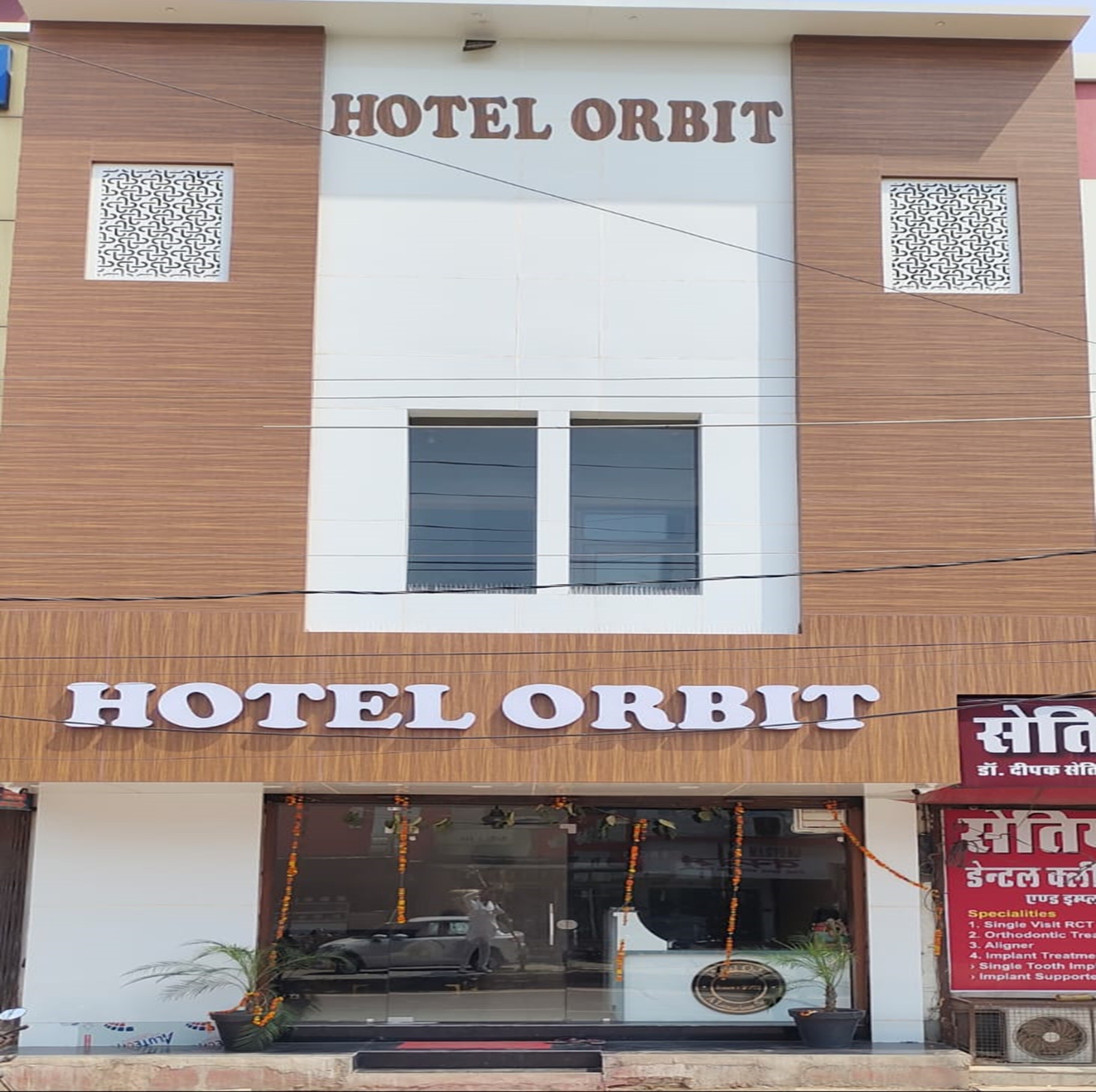 Hotel Orbit - Tap to explore photos