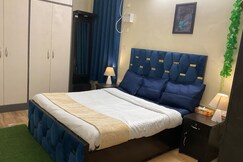Aadiyogi Stays Cozy 2 BHK in Sigra
