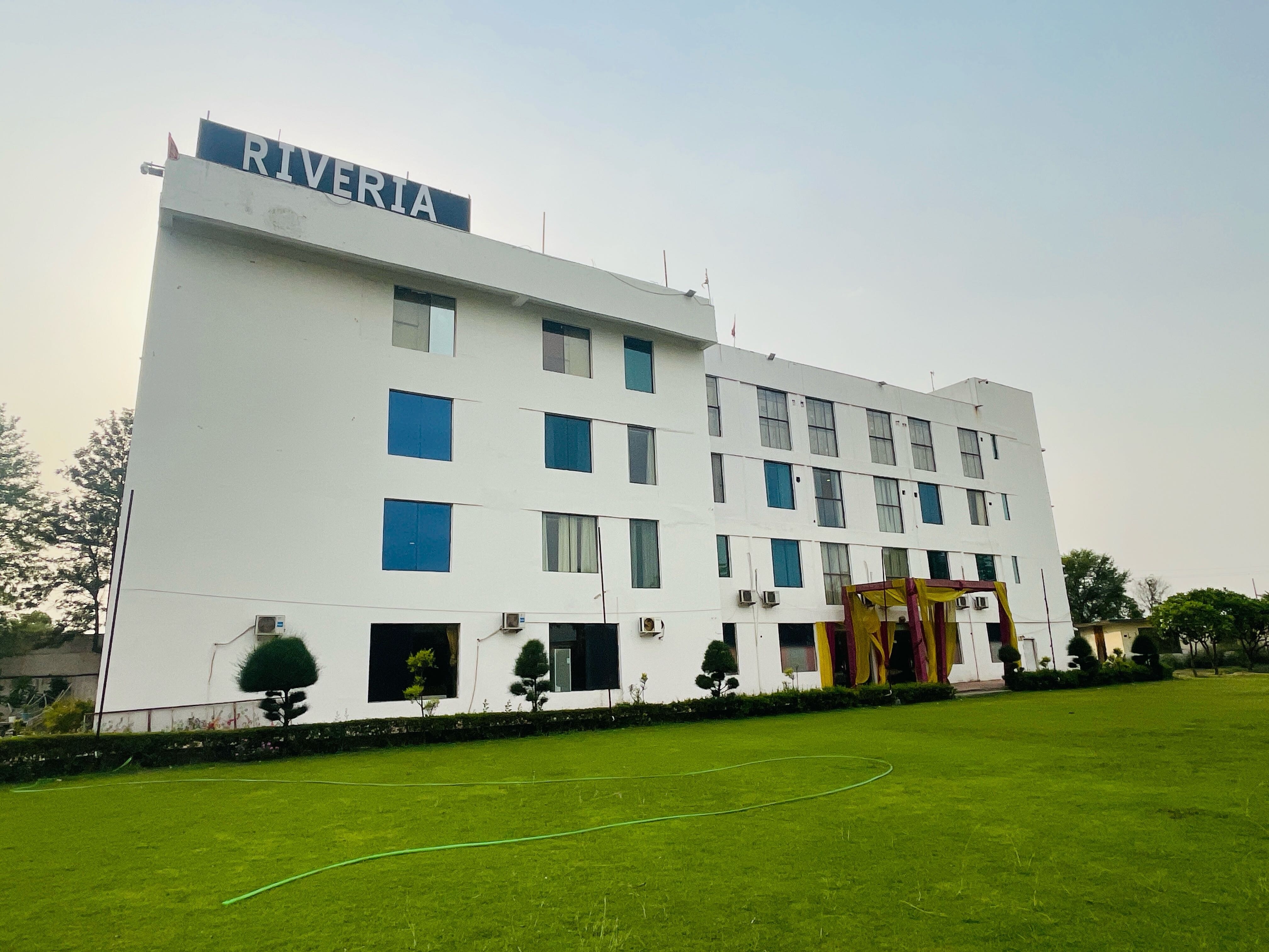 Collection O RIVERIA RESORT - Tap to explore photos