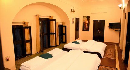 Patnimal Guest House Room Type - Deluxe Quadruple Bed (River Facing) Room