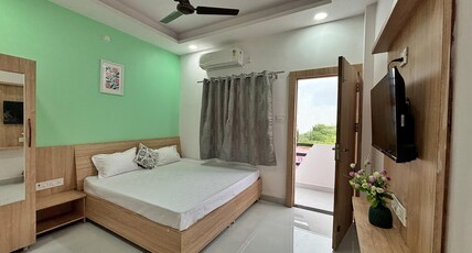 Nandish Room Type - AC Deluxe Room with Balcony
