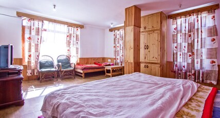 Orchards House - The Hidden Tribe | Hostel Room Type - Deluxe Double room with Attached bathroom