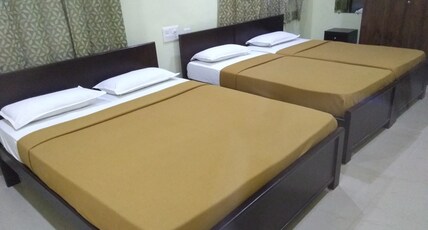 Royal Suvarna Comforts Room Type - 4 Bedded Dormitory AC