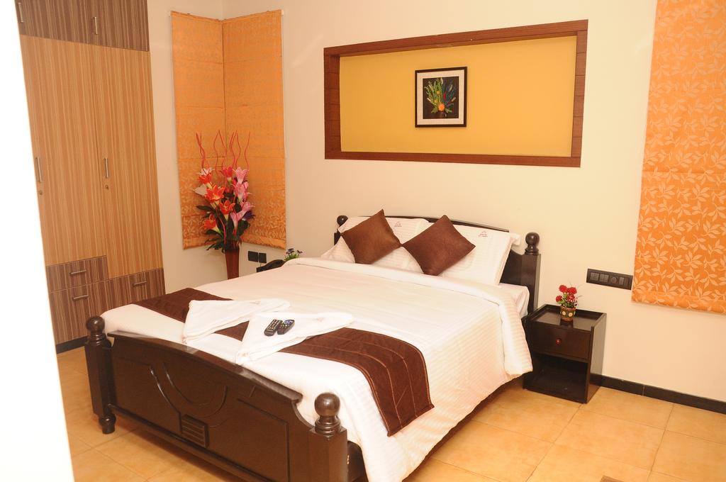 comforts stays service apartment - Tap to explore photos