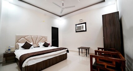 Hotel R K Residency Room Type - Deluxe King Bedroom